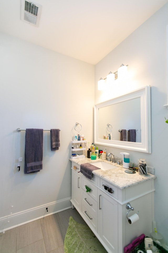 bathroom featuring vanity