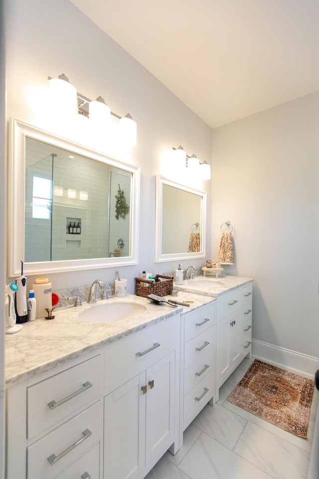 bathroom featuring vanity and a shower