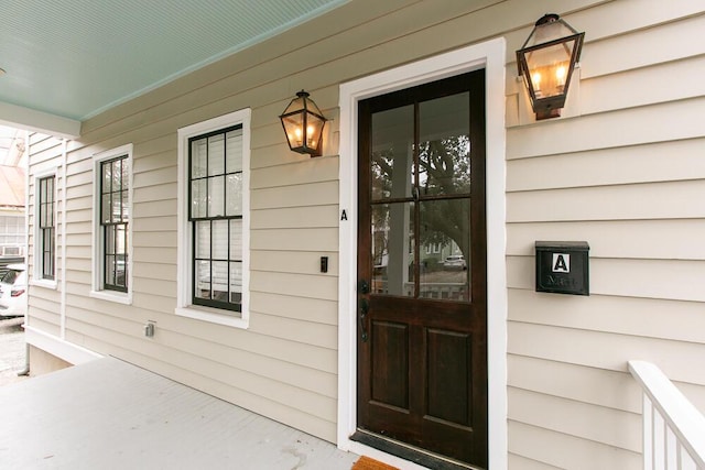 doorway to property with a porch