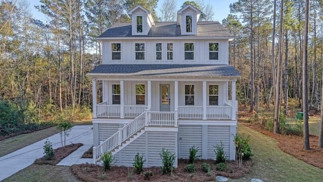 view of front facade featuring a garage and a porch