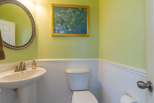 bathroom with toilet and sink