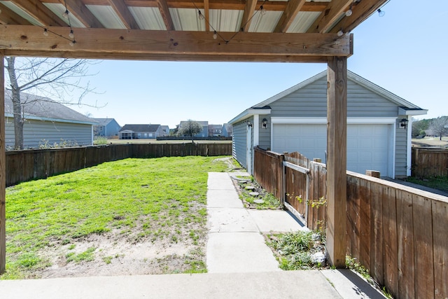 view of yard featuring a garage