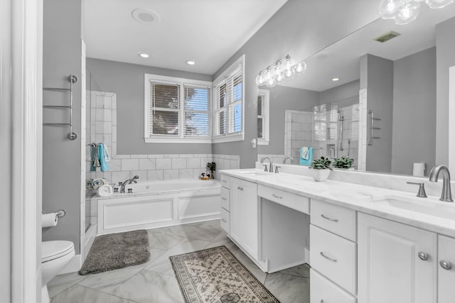 bathroom with double vanity, a sink, visible vents, and a shower stall