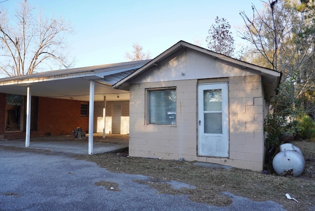150 M L King Blvd, Saint Stephen, SC 29479 - view of front of property featuring concrete block siding and a carport