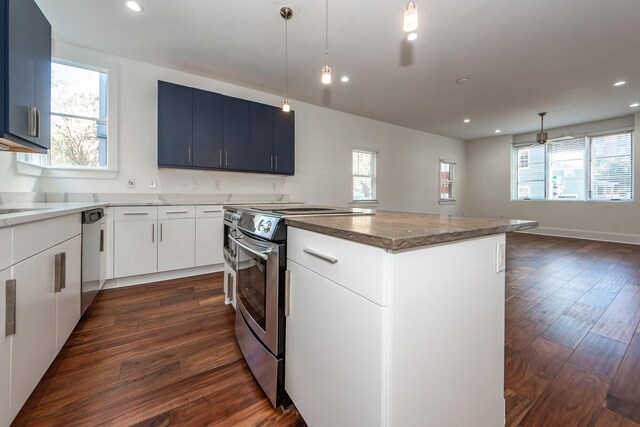 kitchen with white cabinets, pendant lighting, stainless steel appliances, and a kitchen island