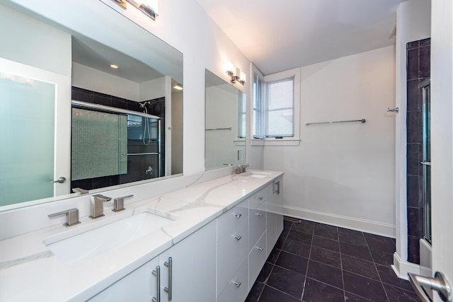 bathroom with vanity, tile patterned floors, and walk in shower