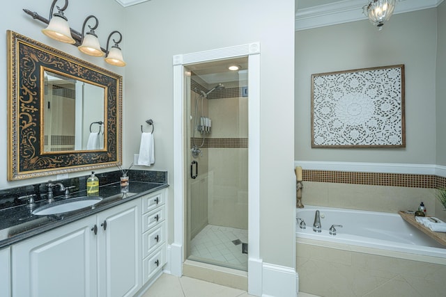 4233 Haulover Dr, Johns Island, SC 29455 - bathroom featuring a shower stall, a bath, vanity, tile patterned floors, and crown molding