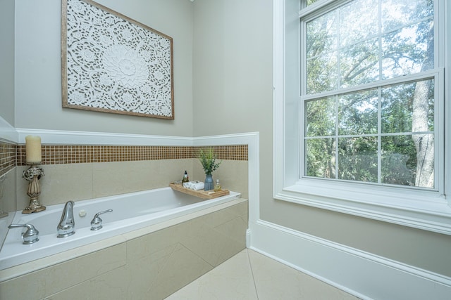 4233 Haulover Dr, Johns Island, SC 29455 - bathroom with a bath and tile patterned floors