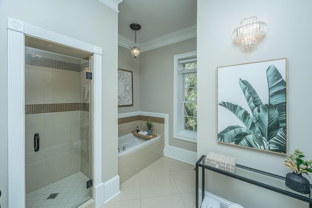 bathroom featuring ornamental molding, separate shower and tub, and tile patterned flooring