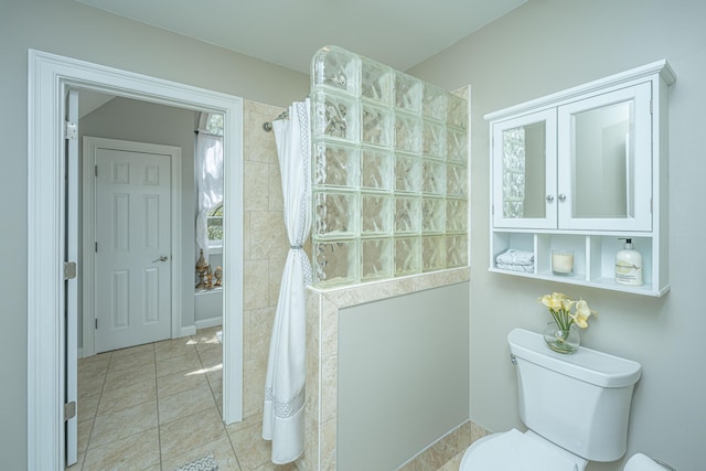 4233 Haulover Dr, Johns Island, SC 29455 - full bathroom with walk in shower, tile patterned flooring, and toilet