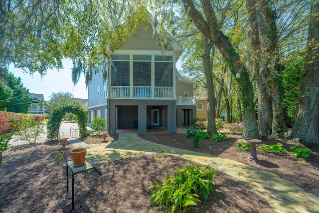 4233 Haulover Dr, Johns Island, SC 29455 - rear view of property with a sunroom