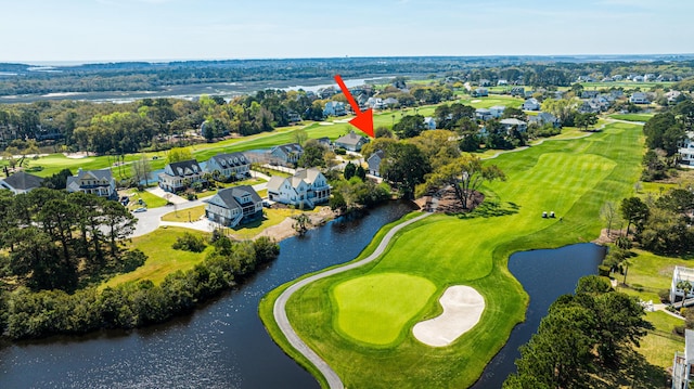 4233 Haulover Dr, Johns Island, SC 29455 - aerial perspective of suburban area featuring a large body of water, a golf club, and a tree filled landscape
