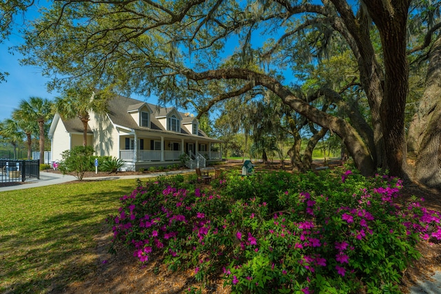 4233 Haulover Dr, Johns Island, SC 29455 - view of grassy yard featuring covered porch