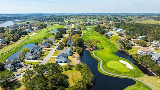 4233 Haulover Dr, Johns Island, SC 29455 - aerial perspective of suburban area featuring a nearby body of water, a golf course, and a tree filled landscape