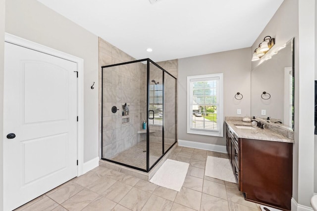 241 Clubside Dr, Lexington, SC 29072 - bathroom with vanity, a shower stall, baseboards, and marble look tiles