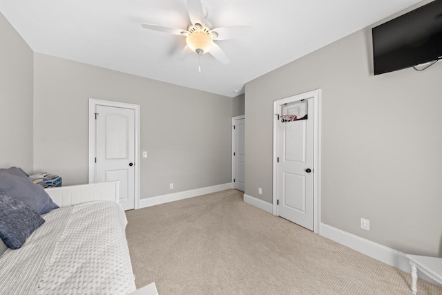 241 Clubside Dr, Lexington, SC 29072 - bedroom with light carpet, baseboards, and ceiling fan