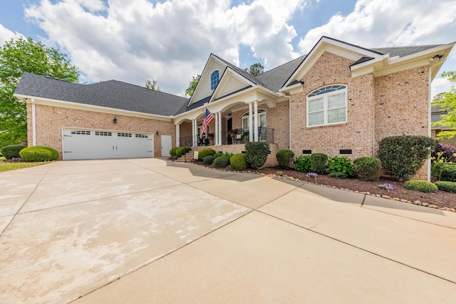 241 Clubside Dr, Lexington, SC 29072 - view of front of home featuring brick siding, covered porch, driveway, and a garage