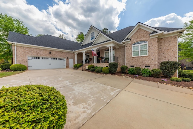 241 Clubside Dr, Lexington, SC 29072 - view of front of home with brick siding, covered porch, concrete driveway, a garage, and crawl space