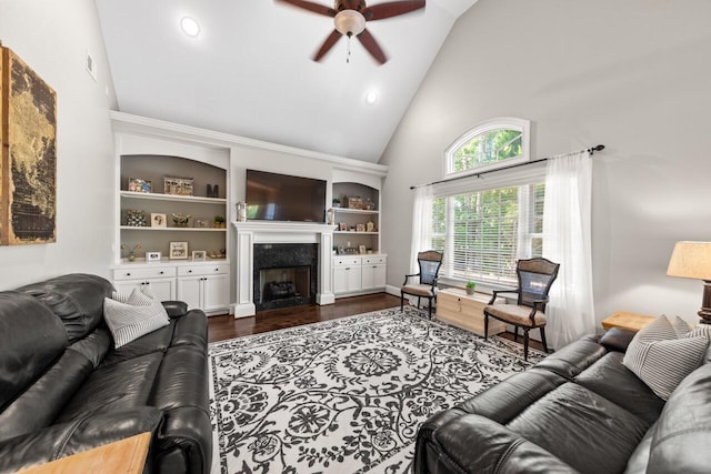 241 Clubside Dr, Lexington, SC 29072 - living area with high vaulted ceiling, a ceiling fan, dark wood-style flooring, a premium fireplace, and recessed lighting