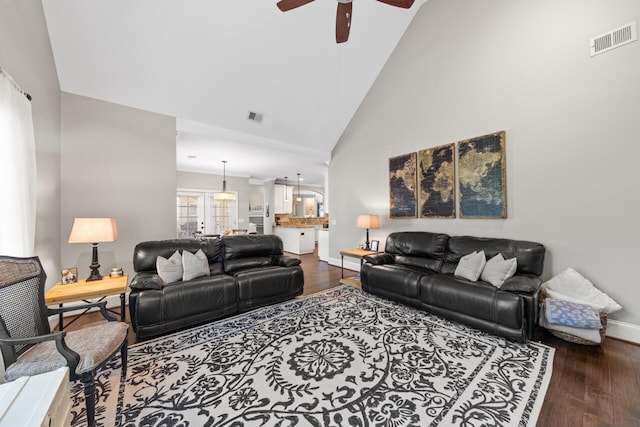 241 Clubside Dr, Lexington, SC 29072 - living room with wood finished floors, a ceiling fan, baseboards, and high vaulted ceiling