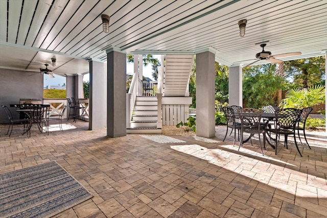 view of patio featuring ceiling fan