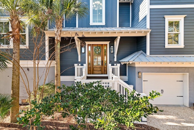 view of exterior entry featuring a garage