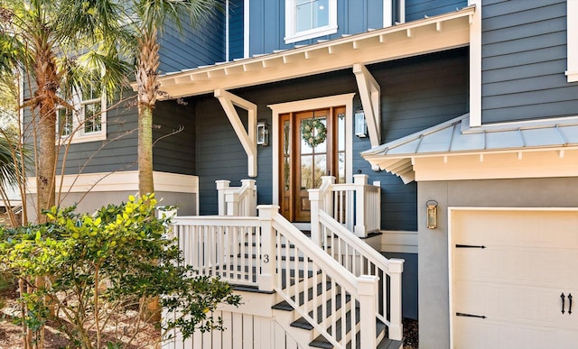 doorway to property featuring a garage