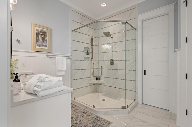 bathroom featuring a shower with shower door