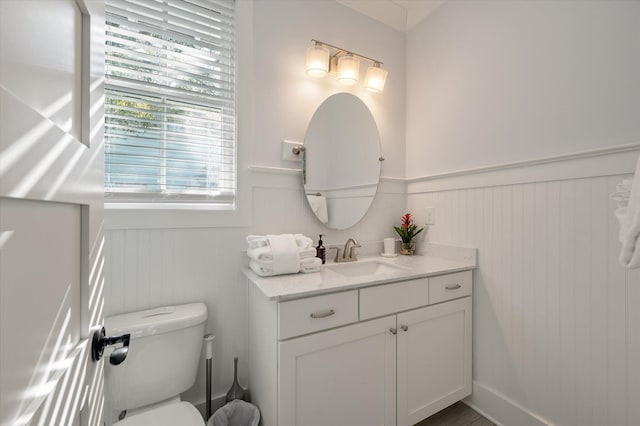 bathroom with vanity and toilet