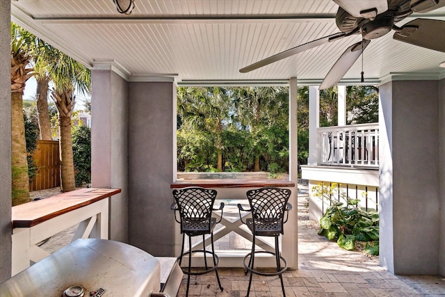 view of patio / terrace featuring ceiling fan