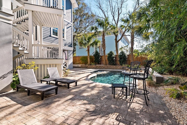 view of swimming pool featuring a patio