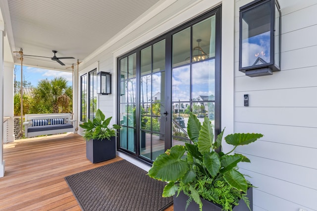553 Old Compass Rd, Daniel Island, SC 29492 - wooden porch with a ceiling fan