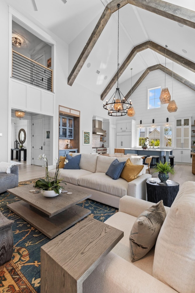 553 Old Compass Rd, Daniel Island, SC 29492 - living area featuring high vaulted ceiling, a chandelier, and beamed ceiling