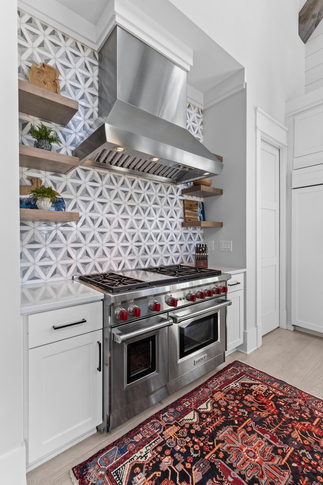 553 Old Compass Rd, Daniel Island, SC 29492 - kitchen with open shelves, double oven range, extractor fan, decorative backsplash, and light countertops