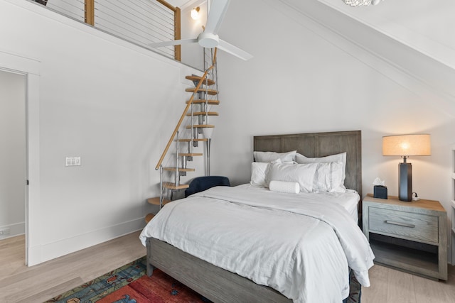 553 Old Compass Rd, Daniel Island, SC 29492 - bedroom featuring wood finished floors, high vaulted ceiling, and baseboards