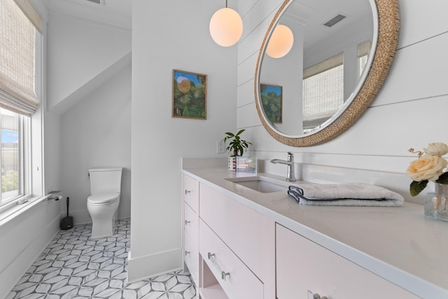 553 Old Compass Rd, Daniel Island, SC 29492 - bathroom featuring plenty of natural light, baseboards, vanity, and toilet