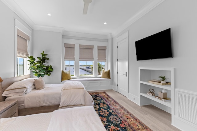 553 Old Compass Rd, Daniel Island, SC 29492 - bedroom with crown molding, light wood-type flooring, multiple windows, recessed lighting, and a ceiling fan