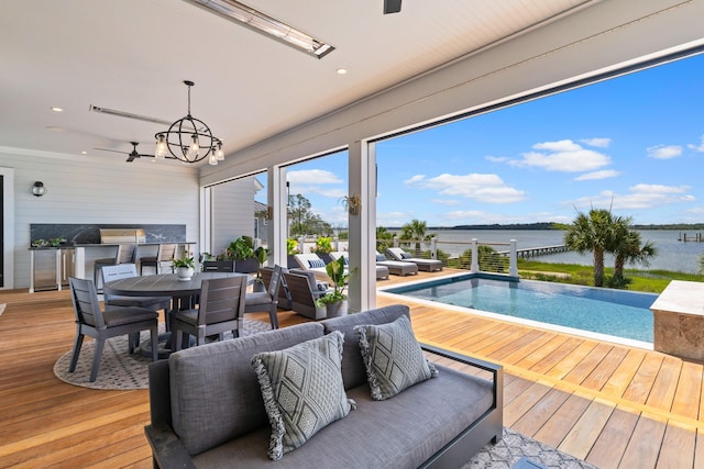553 Old Compass Rd, Daniel Island, SC 29492 - sunroom with a water view and a chandelier