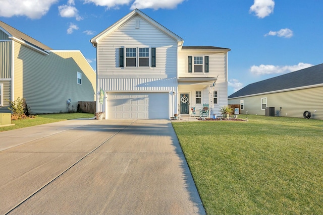 view of front of property with a front lawn, central AC unit, and a garage