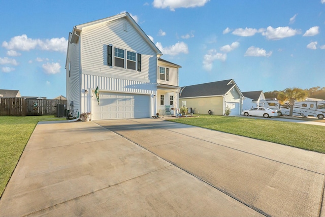 432 Eva St, Moncks Corner, SC 29461 - view of front facade featuring central AC unit, a garage, and a front yard