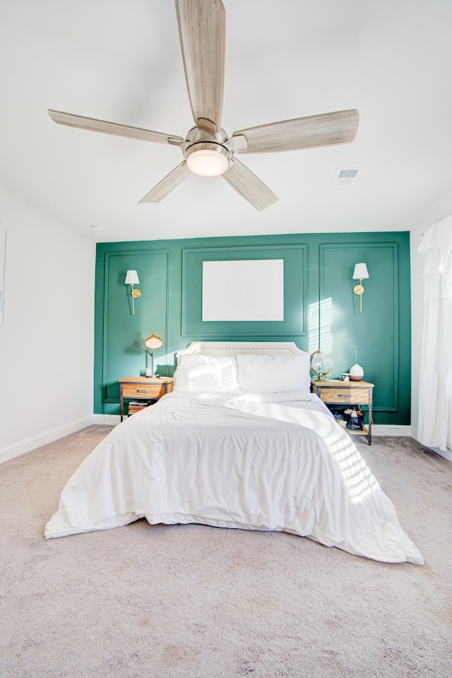 carpeted bedroom with ceiling fan