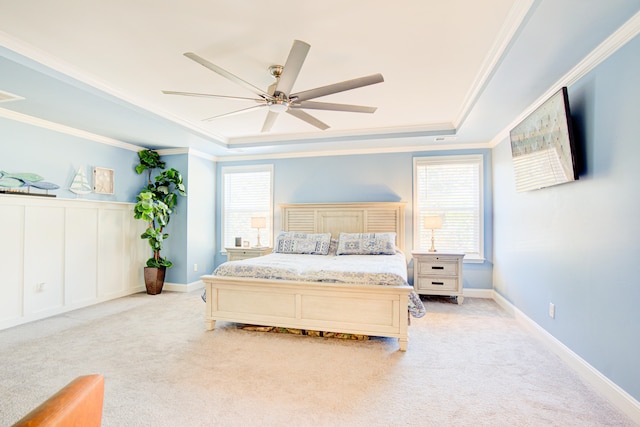 bedroom with multiple windows, ceiling fan, and crown molding