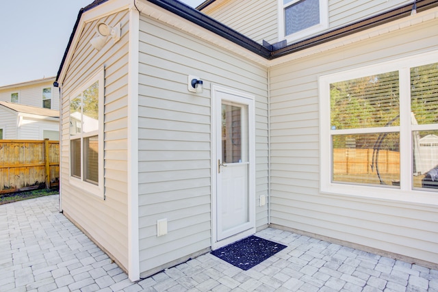 entrance to property with a patio area