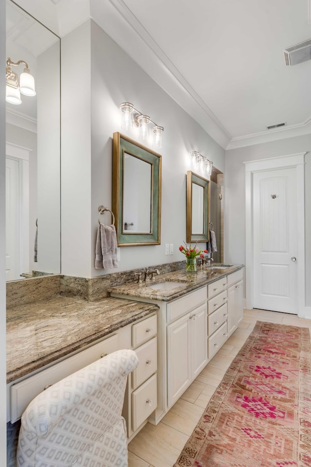 bathroom with vanity, hardwood / wood-style floors, and ornamental molding