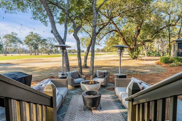 view of patio featuring an outdoor fire pit