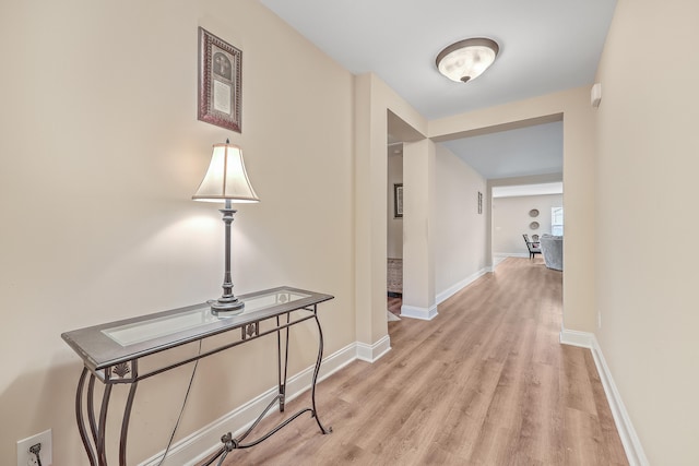 corridor featuring light hardwood / wood-style flooring