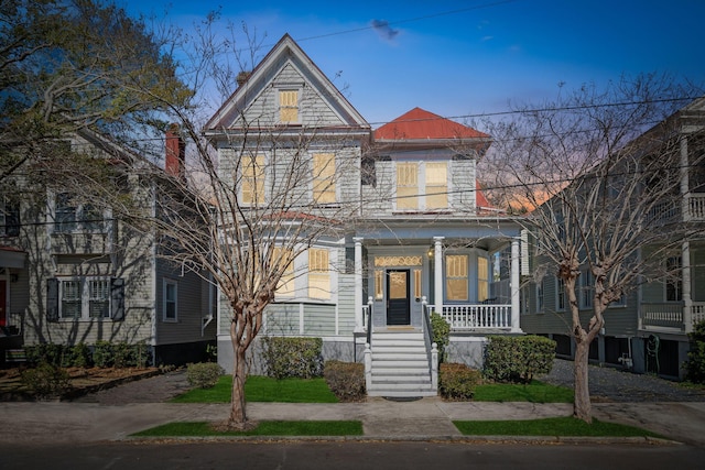 view of front of house with covered porch