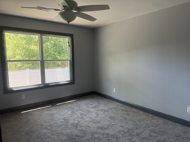 109 NW Haddock Rd, Orangeburg, SC 29115 - carpeted spare room with a ceiling fan and baseboards