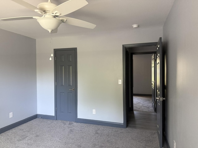 109 NW Haddock Rd, Orangeburg, SC 29115 - spare room featuring carpet floors, ceiling fan, and baseboards