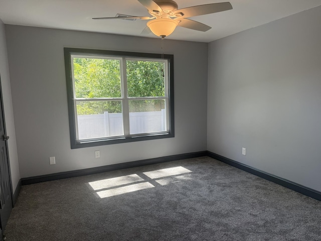 109 NW Haddock Rd, Orangeburg, SC 29115 - empty room featuring carpet flooring, baseboards, and ceiling fan